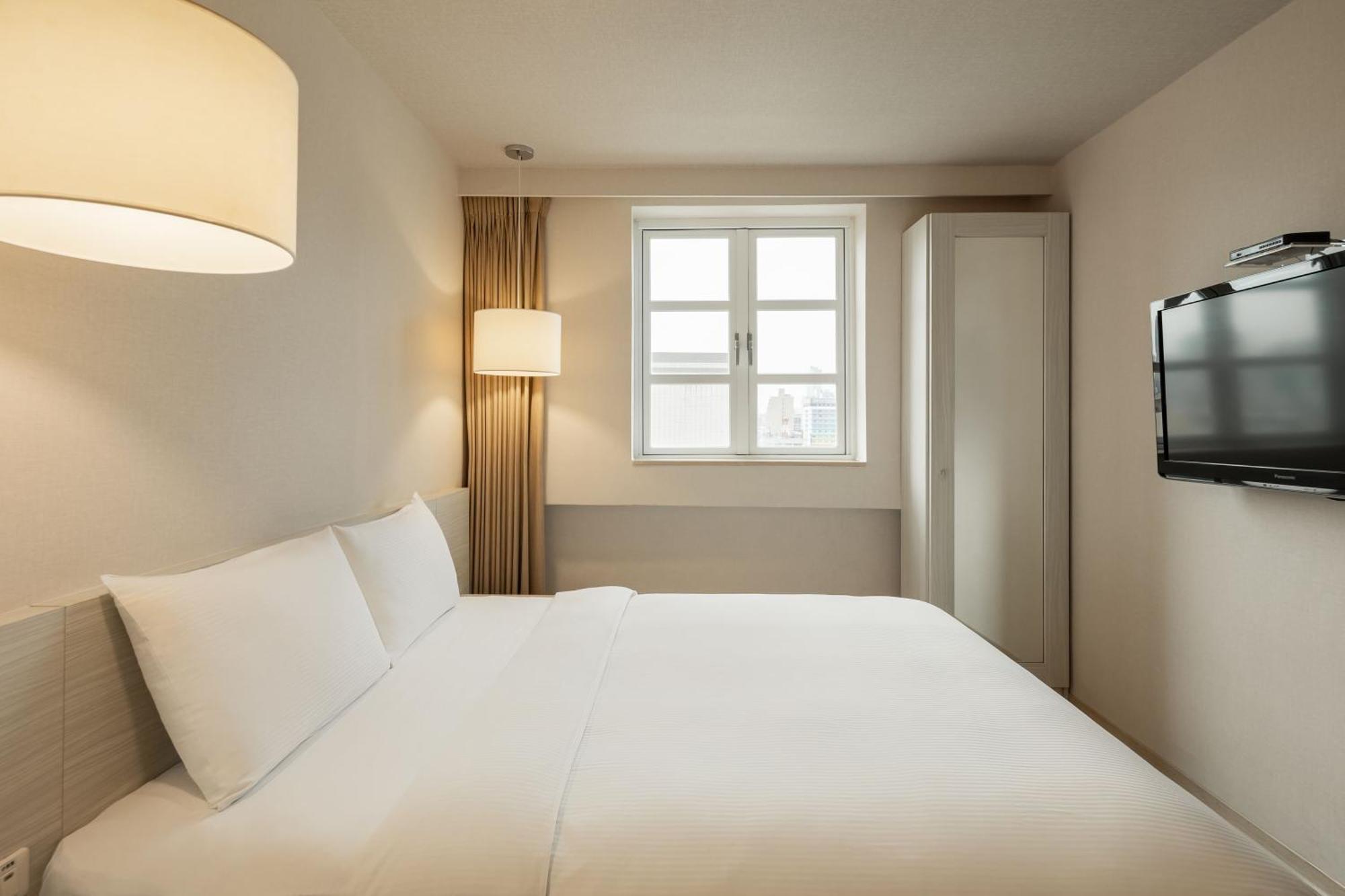 Kindness Hotel - Houyi Jiuru Kao-siung Pokoj fotografie